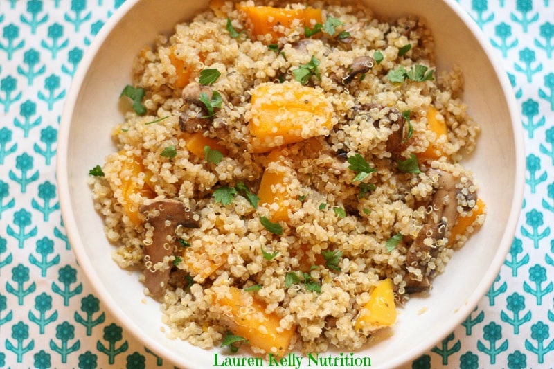 This Mushroom and Squash Quinoa Risotto is delicious and simple to make.  It's also healthy, gluten-free and a huge crowd pleaser! www.laurenkellynutrition.com
