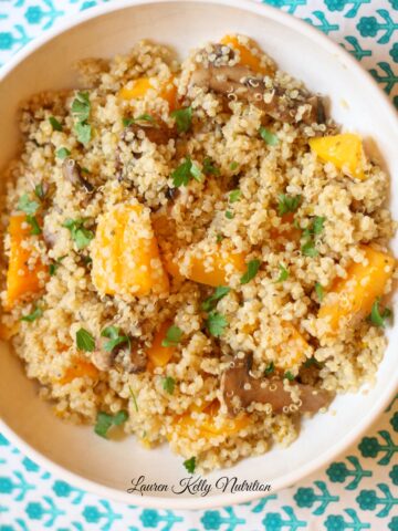 This Mushroom and Squash Quinoa Risotto is delicious and simple to make. It's also healthy, gluten-free and a huge crowd pleaser! www.laurenkellynutrition.com