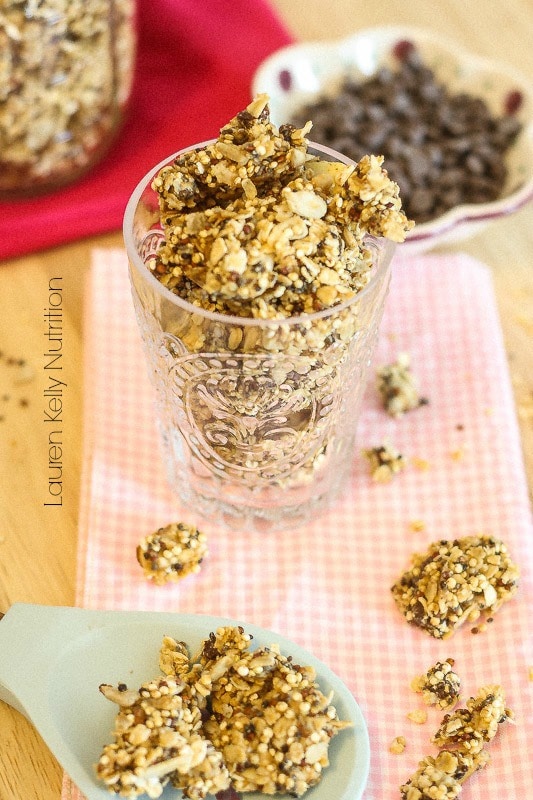 Peanut butter chocolate chip granola in a clear glass. 