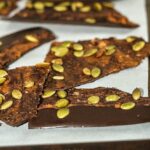 This 4 ingredient Pumpkin Dark Chocolate Bark is the perfect sweet and salty treat! www.laurenkellynutrition.com