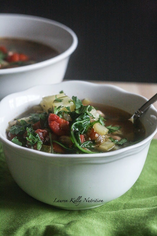 Quinoa Vegetable Soup in white bowls.