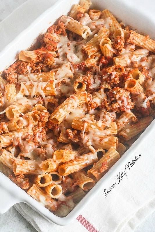 Overhead picture of a easy baked ziti in a white baking dish.