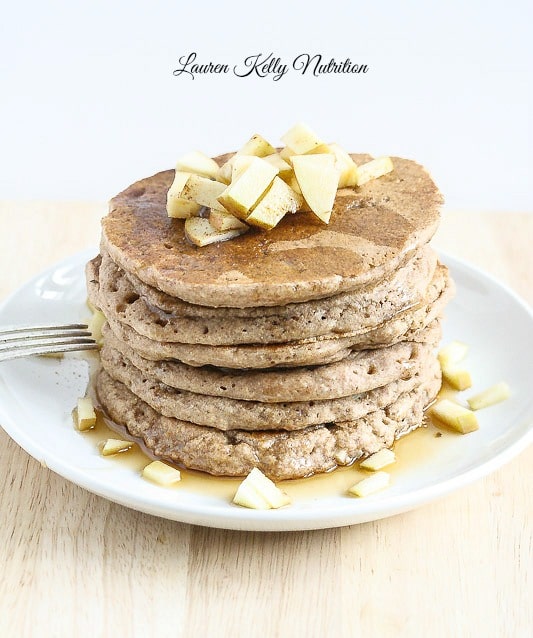 Close up of Apple Cinnamon pancakes on a white plate.