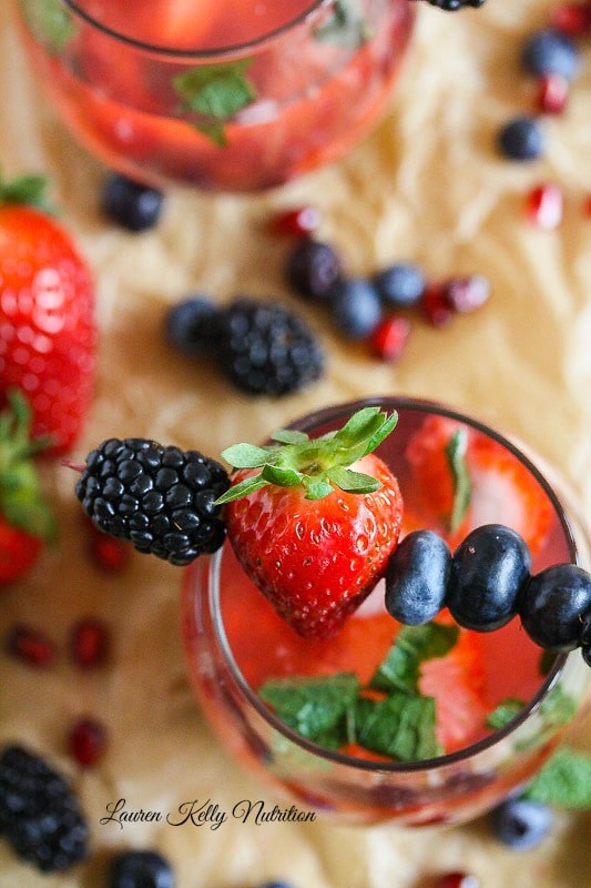 Overhead picture of Berry Wine Spritzer  with berries on top.