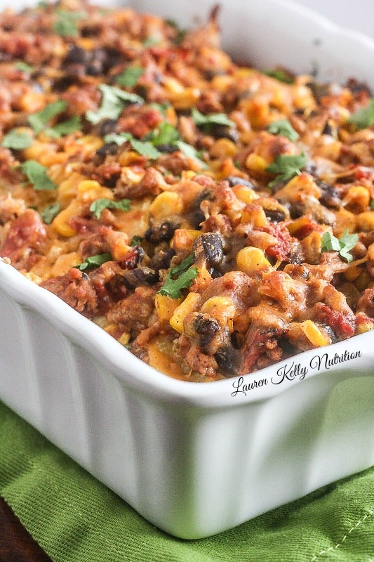 Mexican Quinoa Lasagna in a white casserole dish.