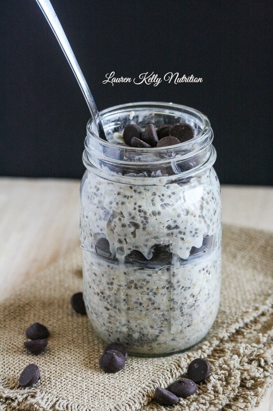 Creamy Chocolate Chip Overnight Oats in a mason jar with a spoon in it.