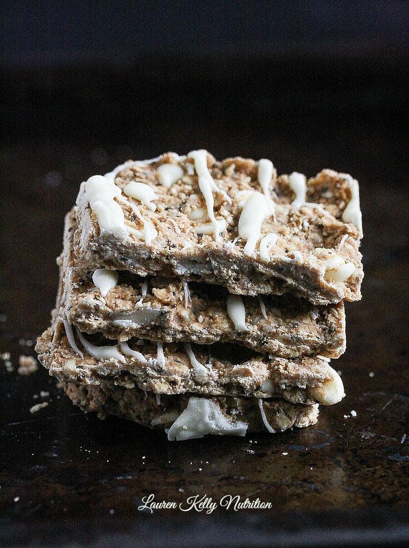 These No Bake White Chocolate Protein Bars are simple to make and packed with 10 grams of protein per bar! I keep these in my refrigerator at all times! #vegan #dairyfree #glutenfree