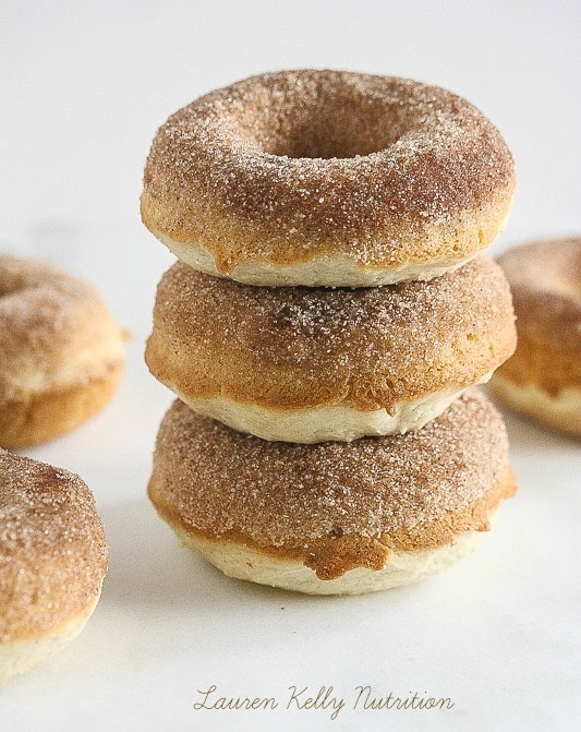 The cake-like doughnuts are lightly spiced with cinnamon and nutmeg, rolled in cinnamon sugar. and gluten-free. www.laurenkellynutrition.com