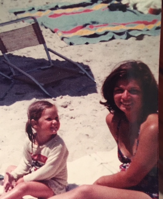 Picture of my mom and me on the beach.