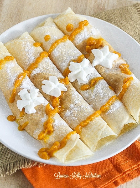 Pumpkin Filled Crepes on a white plate.