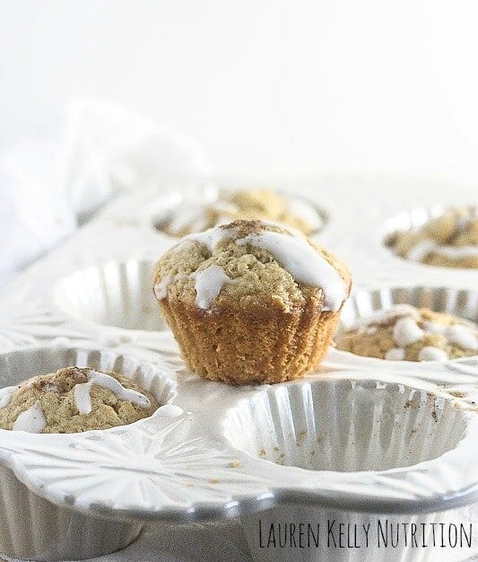 Eggnog Muffins on a white muffin tray.