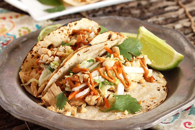 Horizontal picture of Thai Chicken Tacos on a plate.