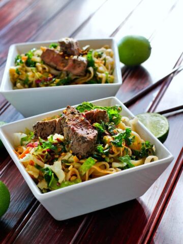 Gluten Free Spicy Rice Noodle Salad - 2 Ways! Cold gluten free noodles are a healthy addition to any meal. You can spice them up and then add a protein for a main meal, or try this dish vegan friendly by just adding veggies and chopped nuts.