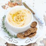 Roasted garlic white bean dip in a bowl.