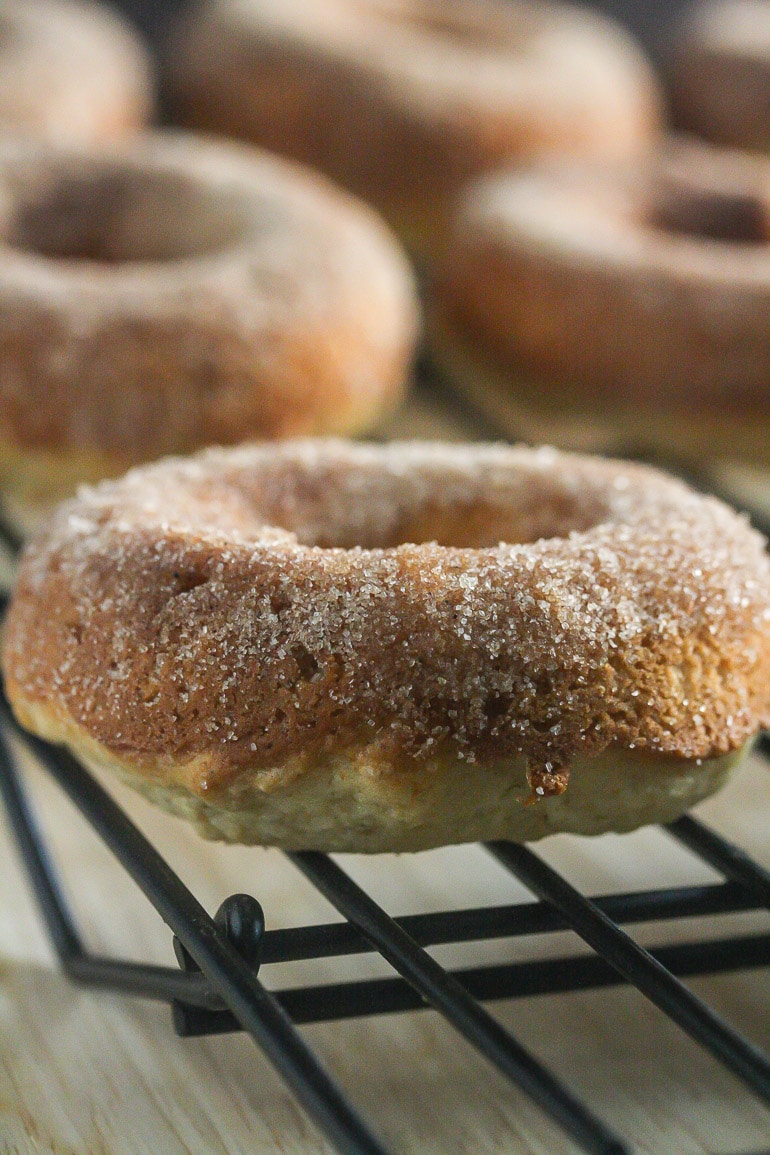 Close up Baked Apple Cider Donuts on a rack,