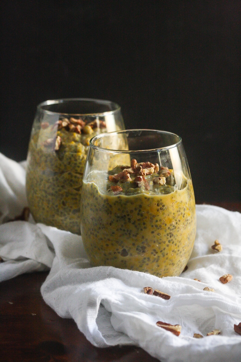 Pumpkin Pie Chia Seed Pudding in clear jars.
