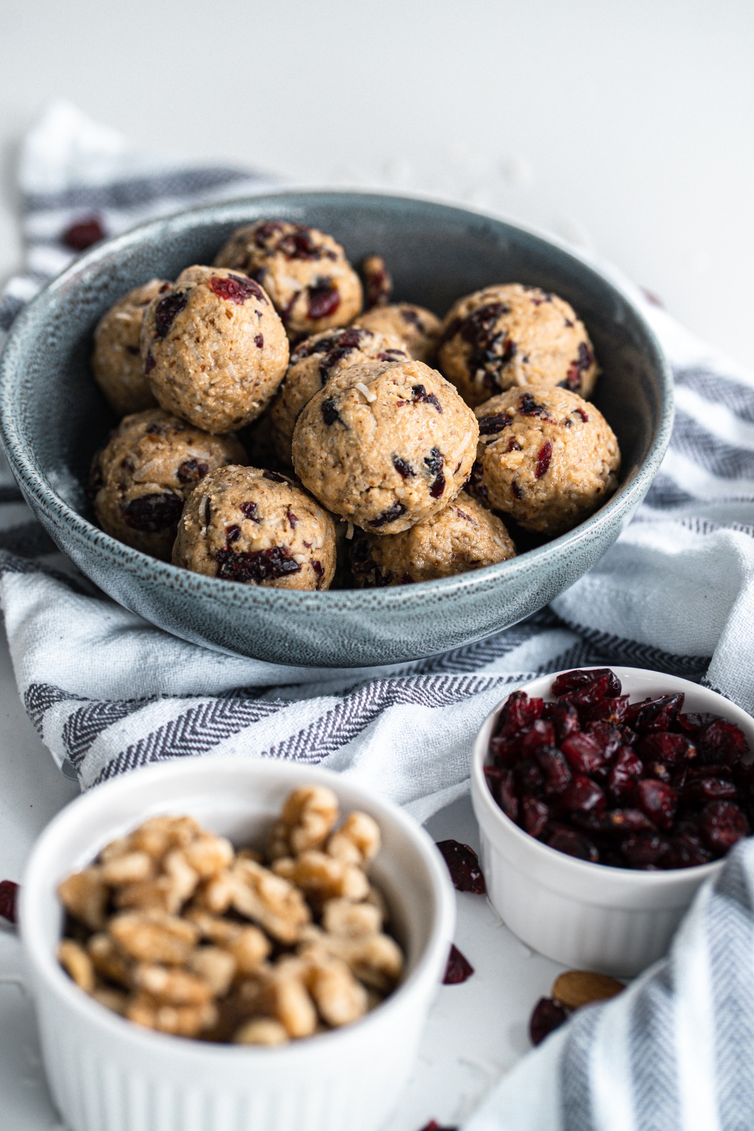 Cranberry Almond Balls in a blue bowl.