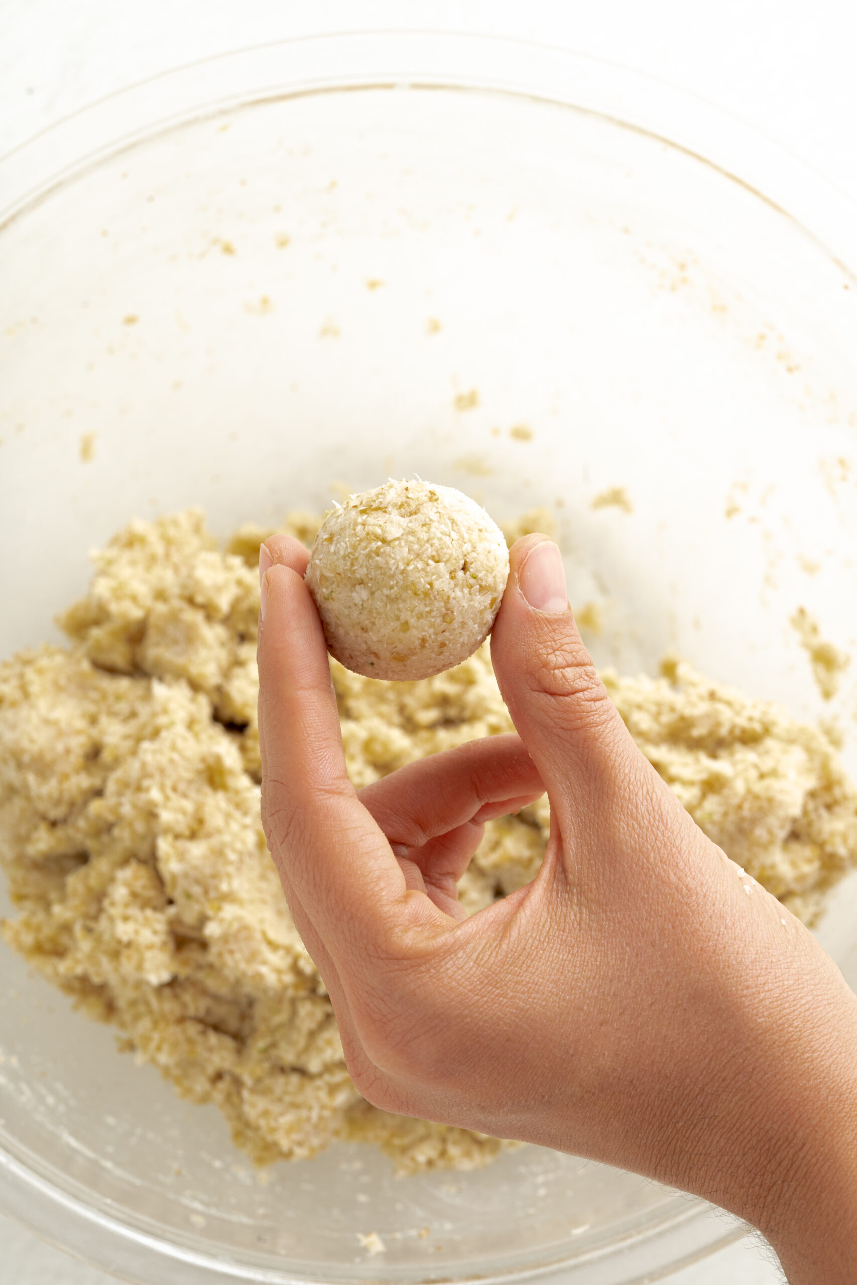 Rolling balls with truffle mixture.