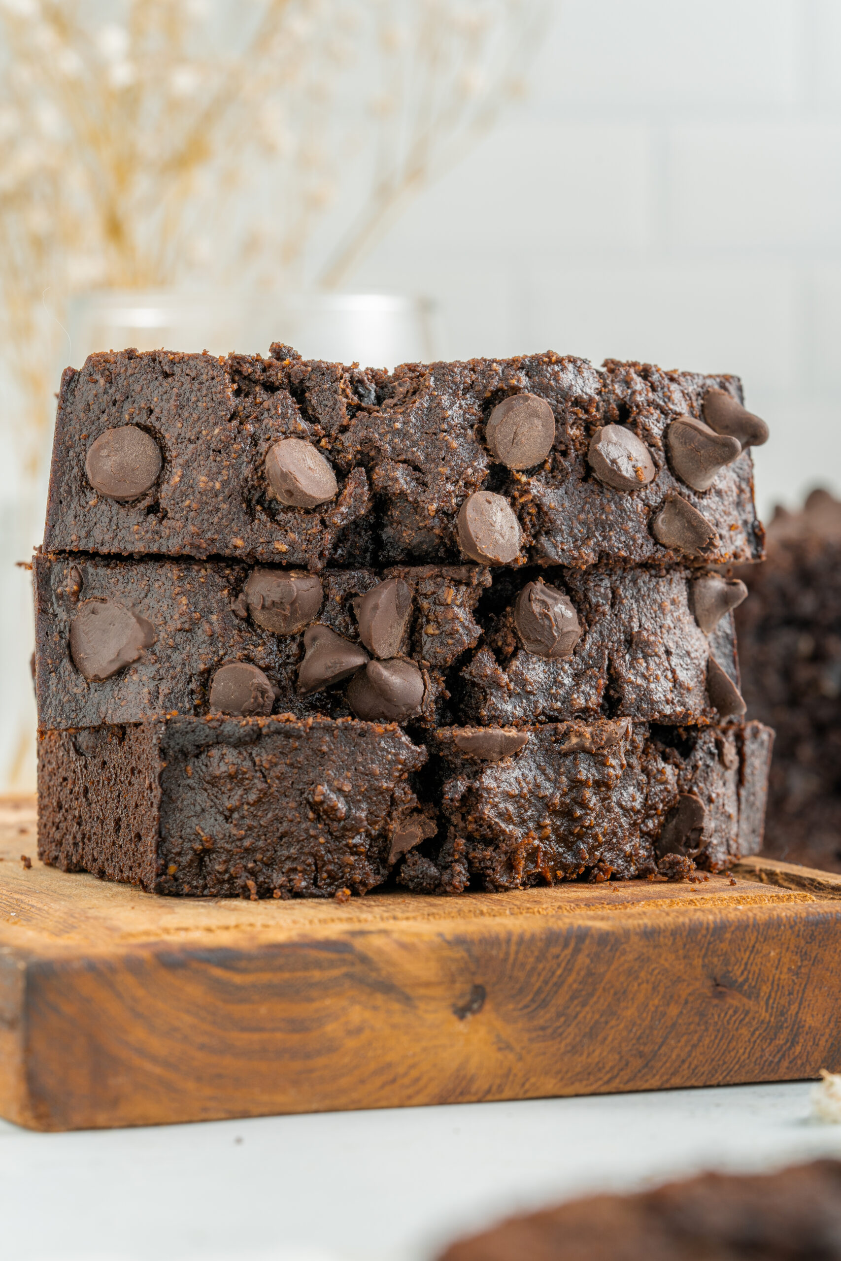 Stacked slices of chocolate zucchini bread.