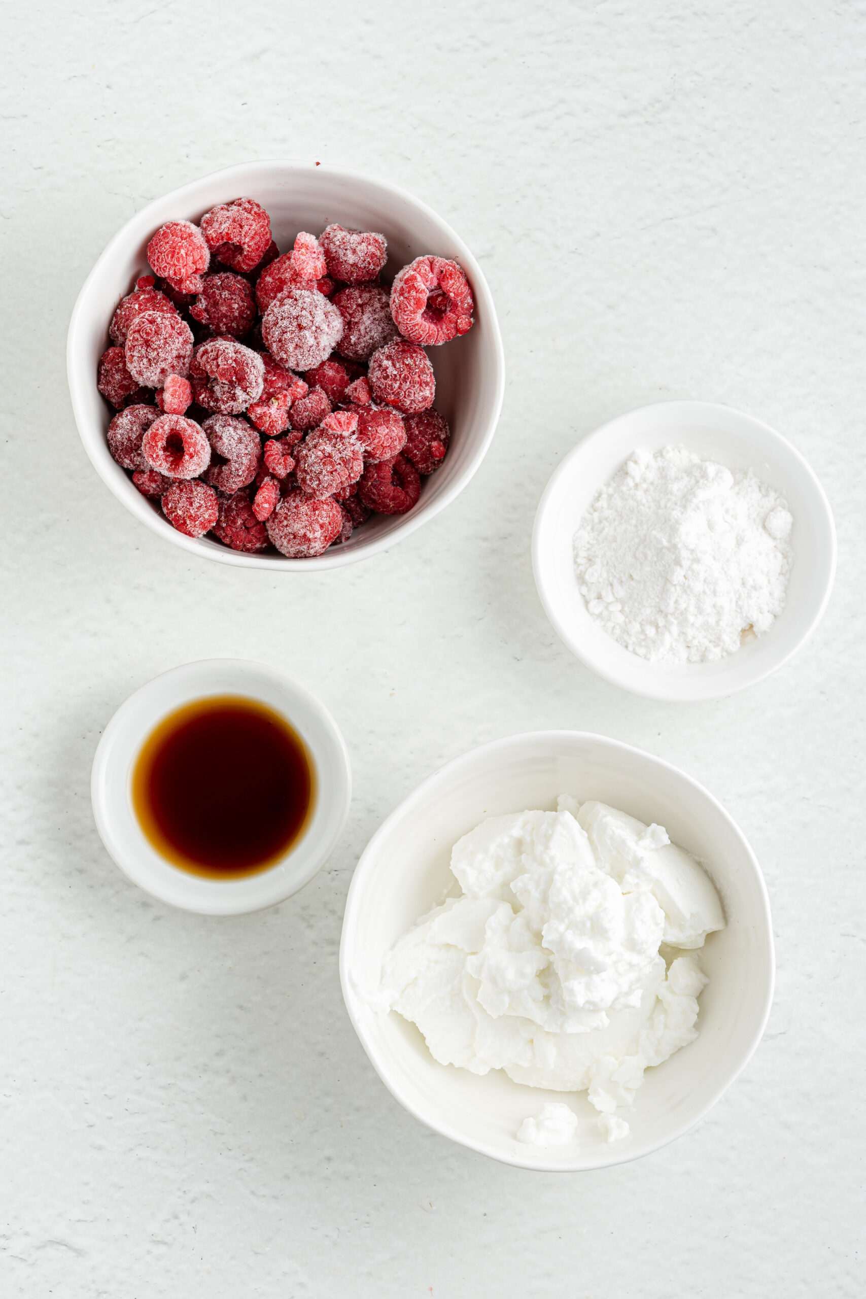 Ingredients for raspberry yogurt popsicles.