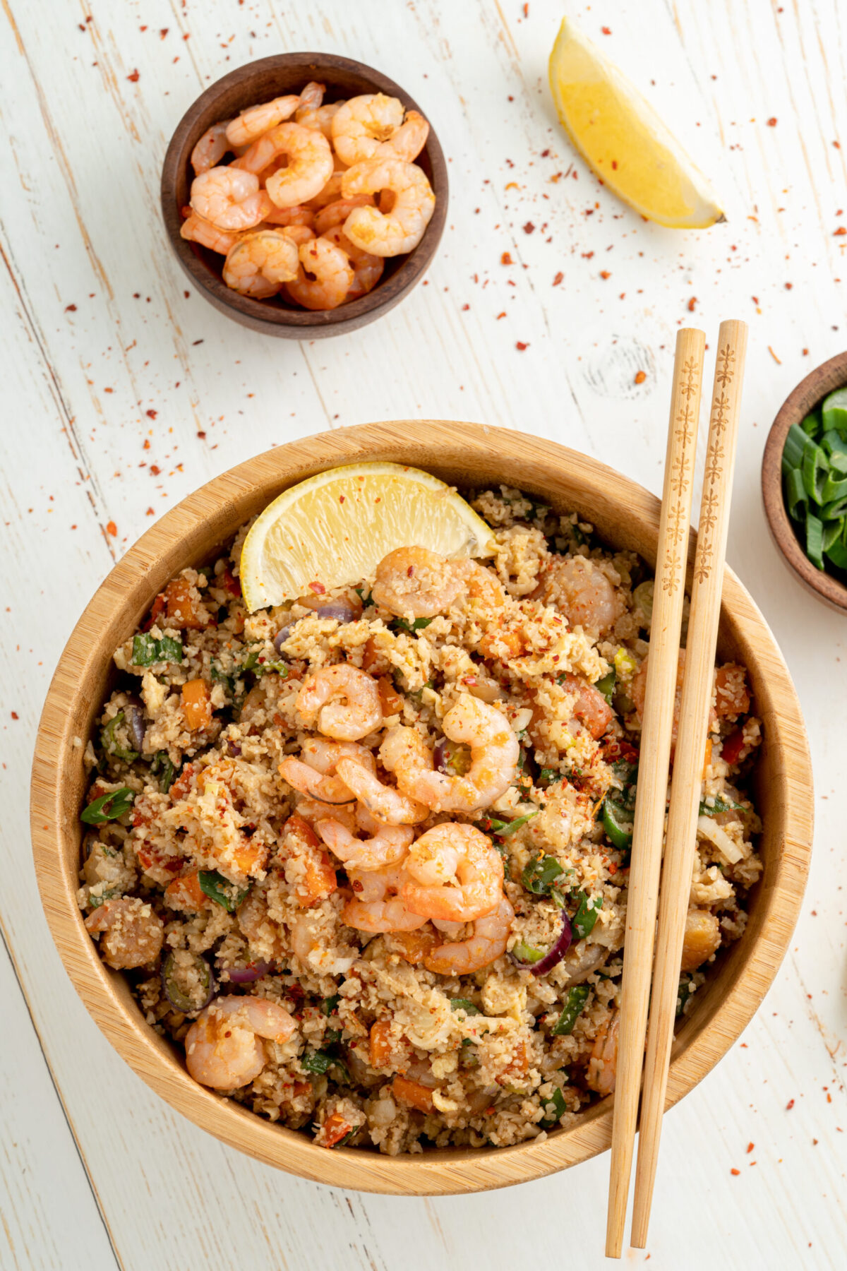 This Shrimp Fried Cauliflower Rice is always a crowd pleaser. Your favorite takeout dish is now low carb, easy to make, healthy and delicious!