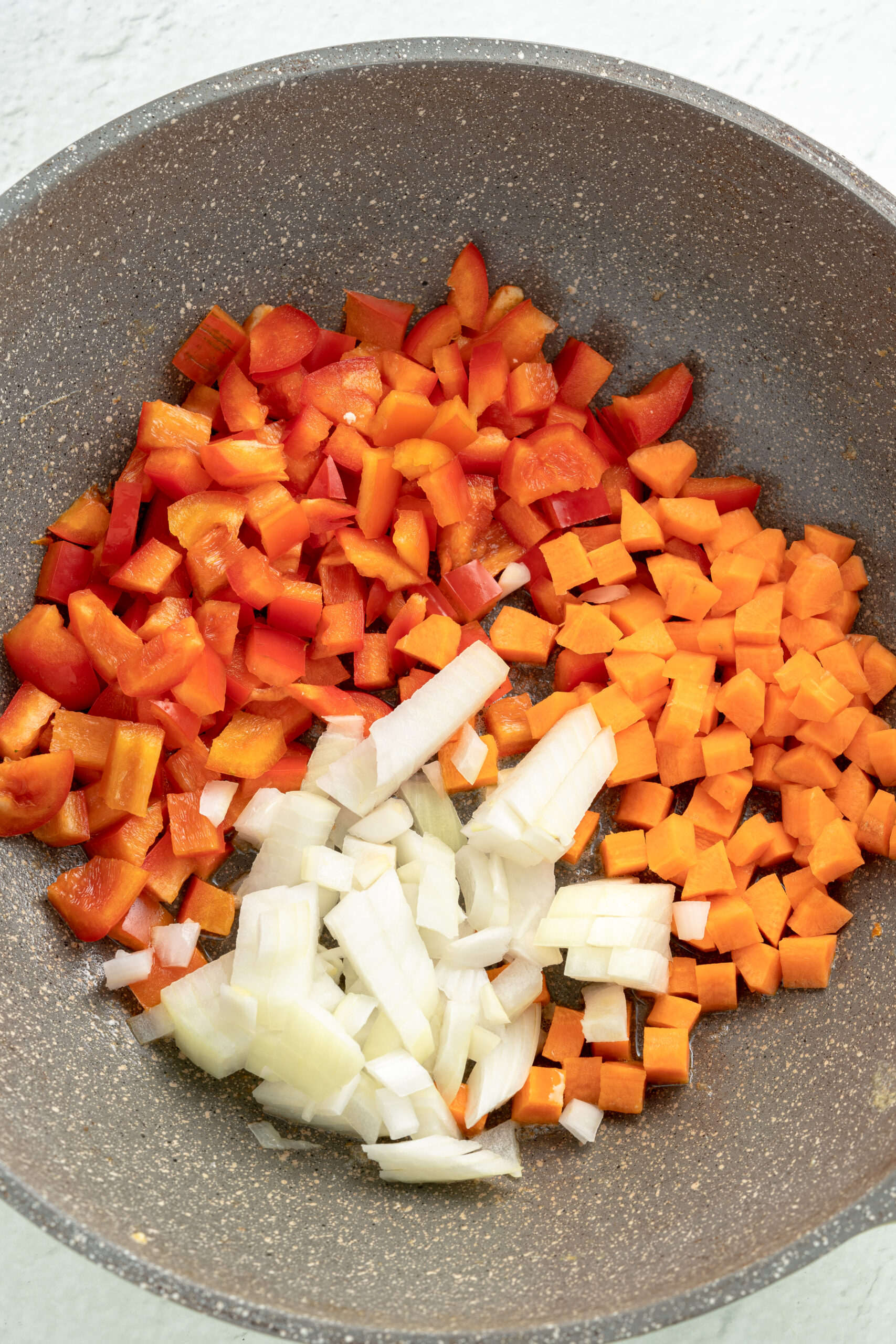 Diced vegetables in bowl.