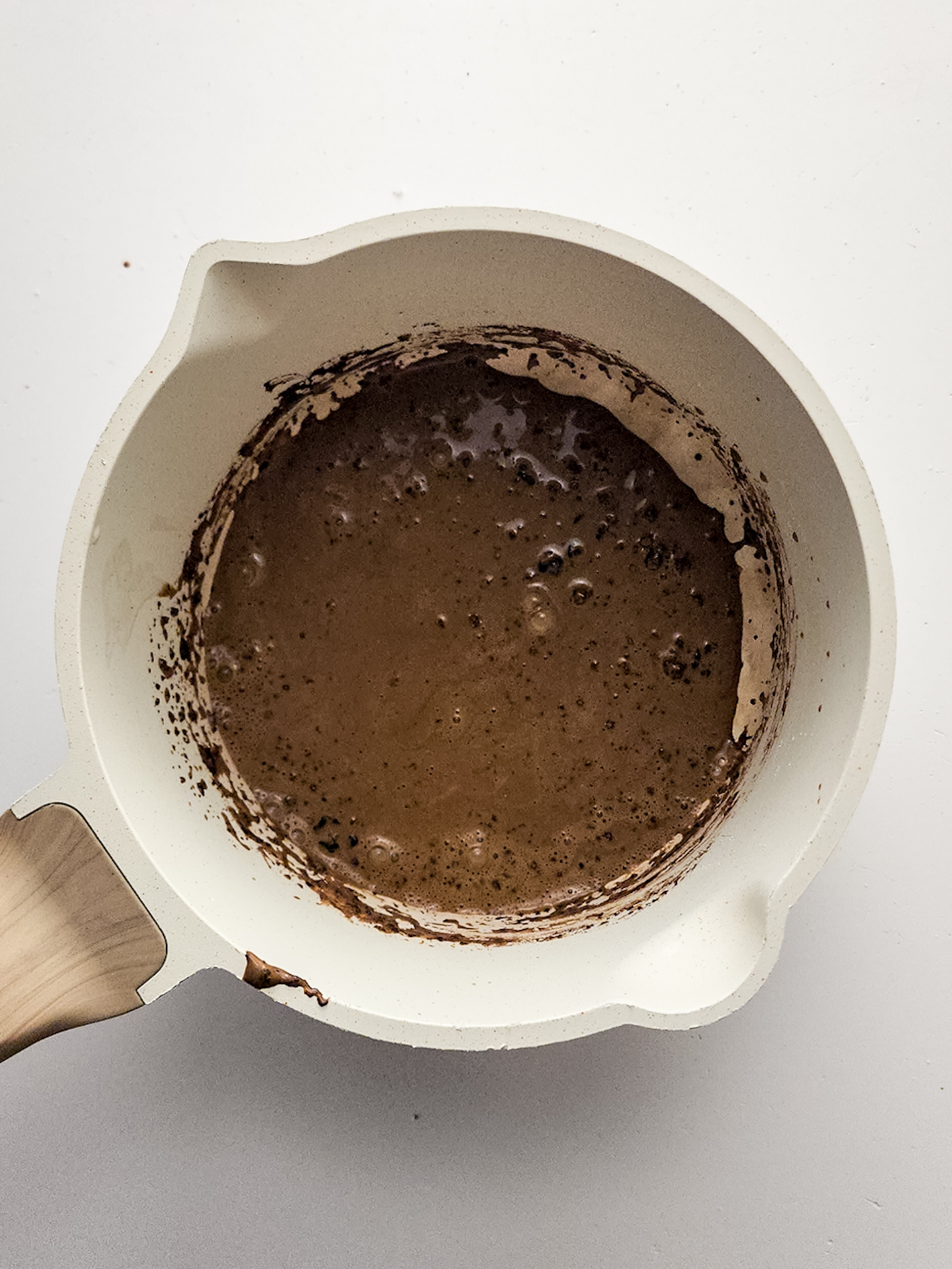 Cooked cocoa mixture for in a saucepan.