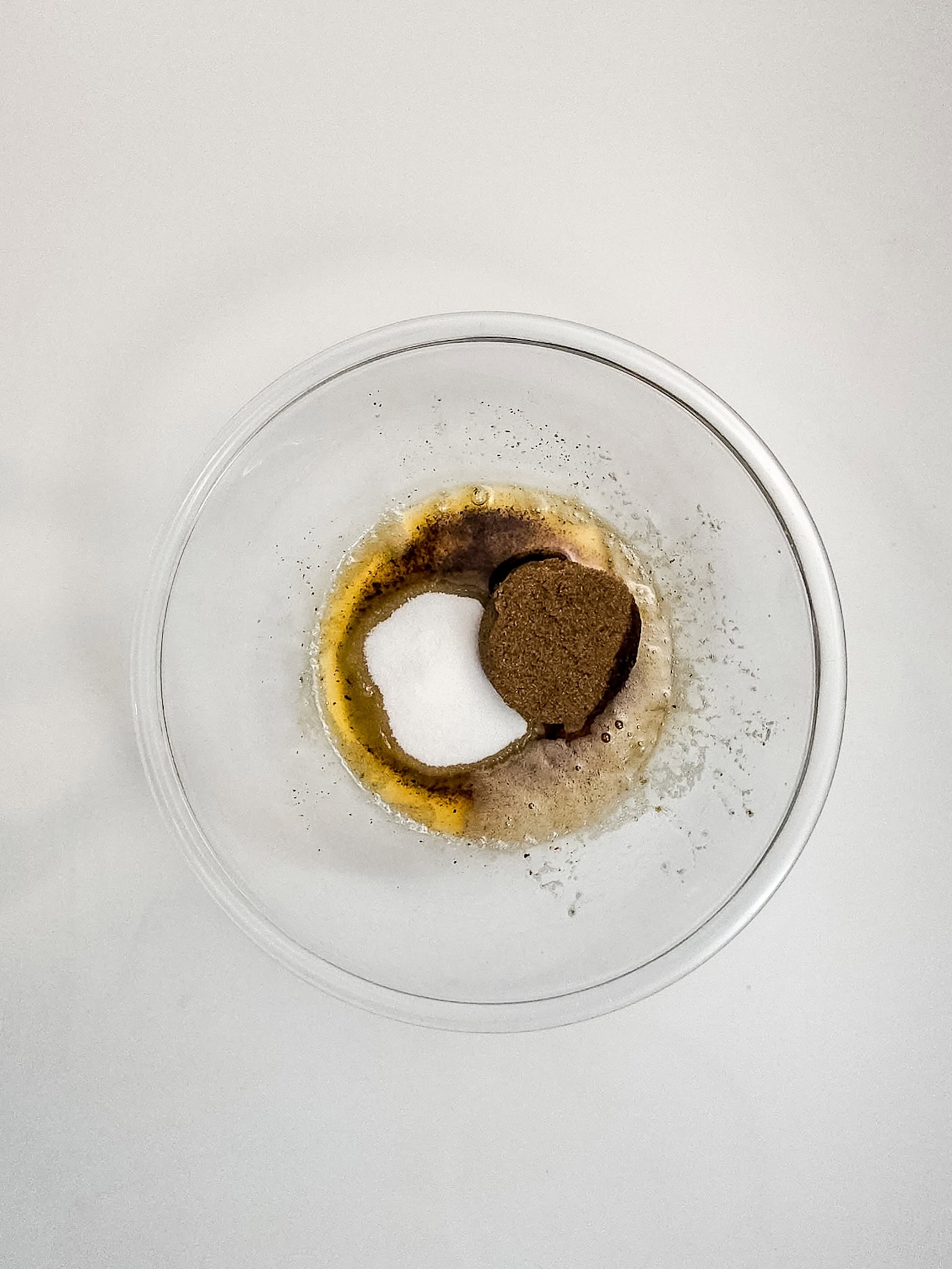 Dry ingredients in a glass bowl.
