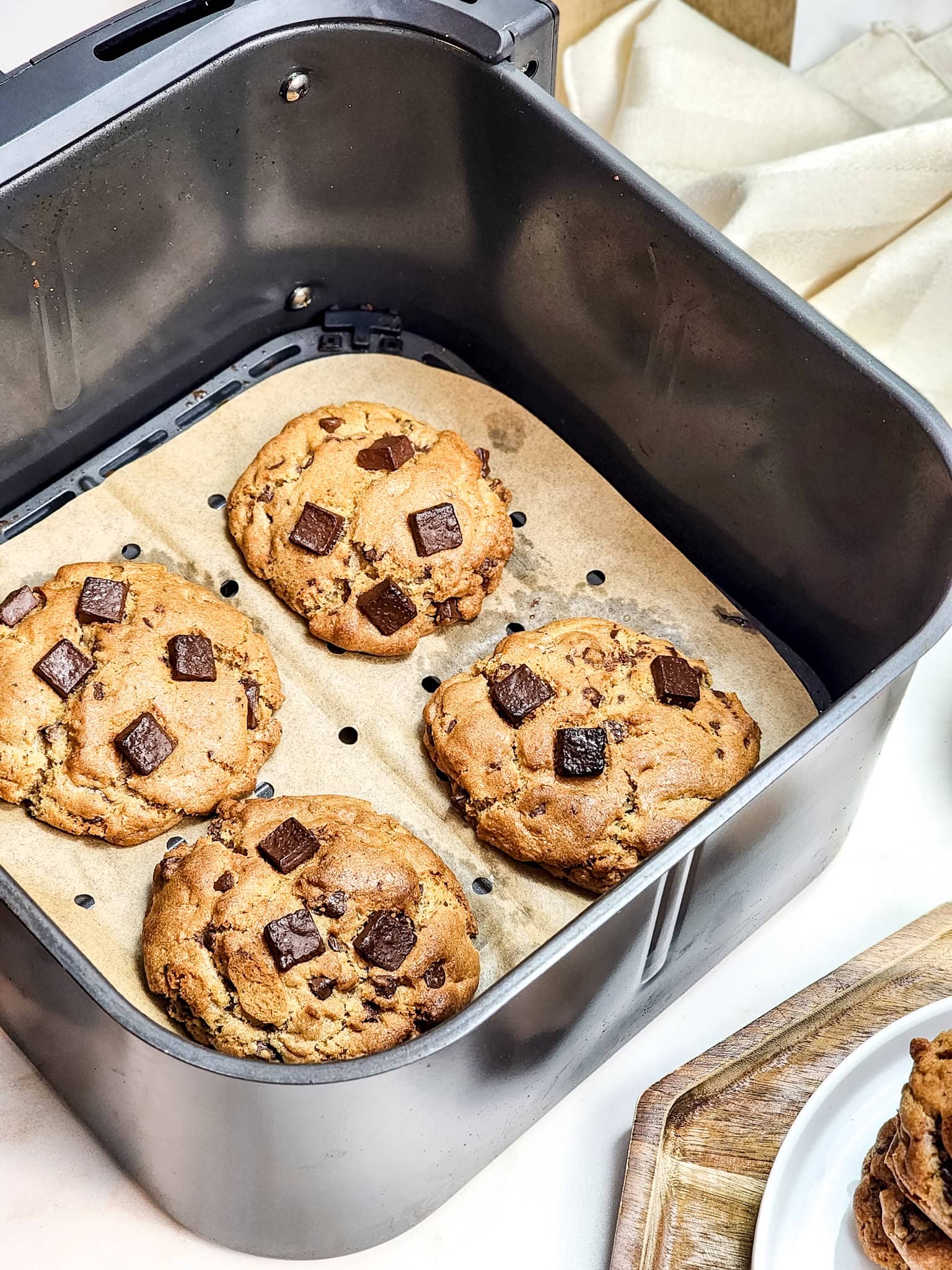 Chocolate chip cookies in air fryer cooked.