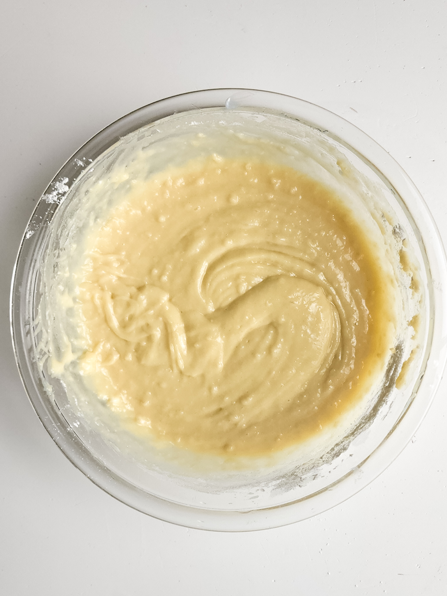 Ingredients mixed in a clear bowl.