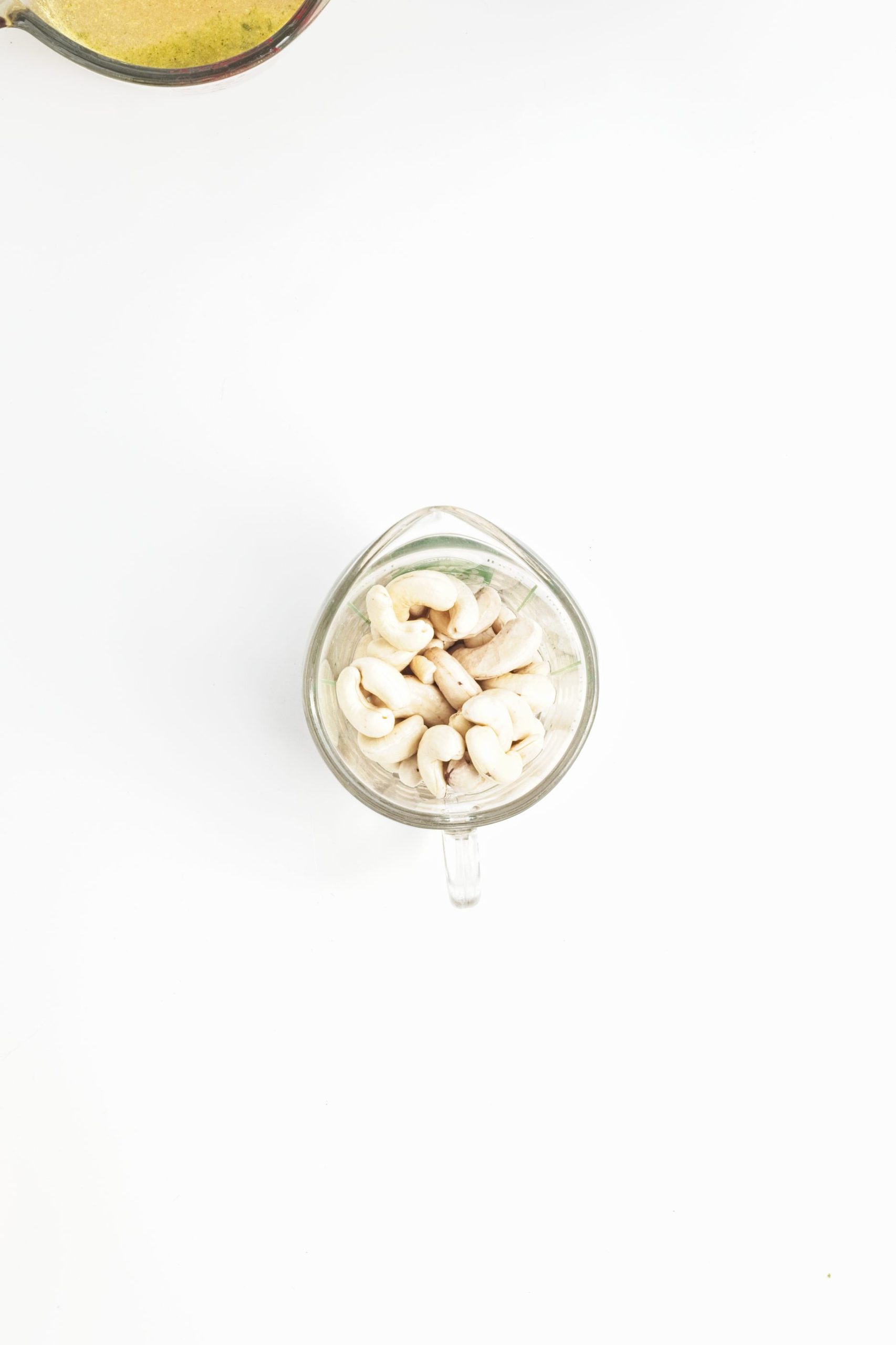 Cashews in a glass bowl.