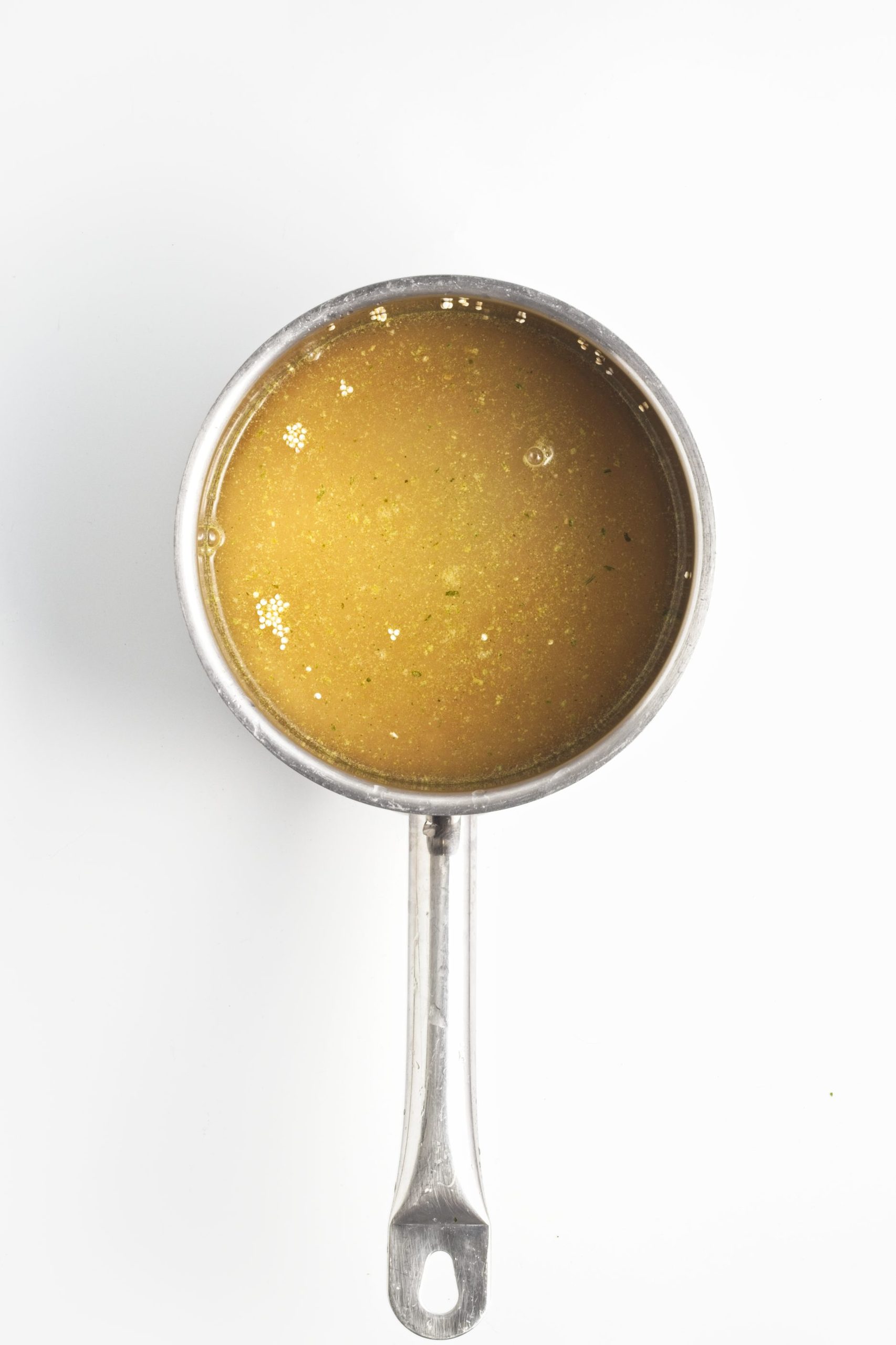 Lemon juice and maple syrup added to blender.